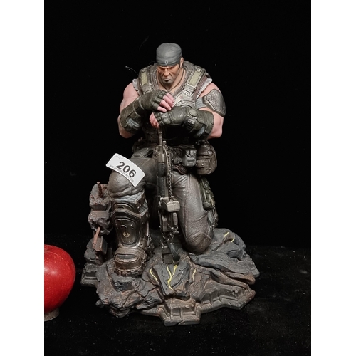 206 - A large collectible figure of the Marcus Fenix character from the 