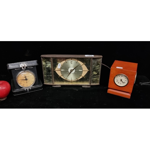 285 - Three clocks including a nicely proportioned Mid Century mantle clock by Metamec, with fabulous a fa... 