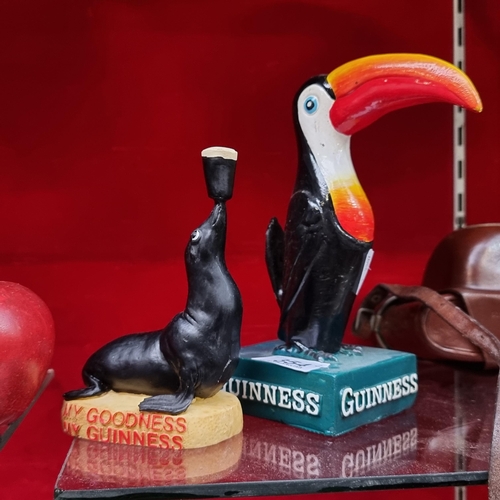 354 - Two Guinness figures including the iconic toucan and sea lion.