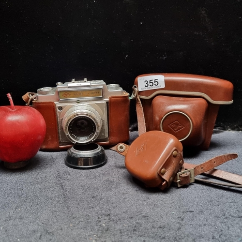 355 - An Agfa Ambi Silette film camera with Agfa Colour Solinar lens 8/50 in original leather travel case.