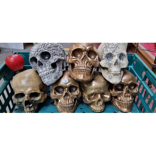 400 - A selection of 7 ornamental skull props from a well-known UK based prop house, these skulls have ben... 