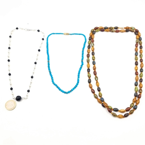 441 - A collection of three vintage necklaces, the first is a Turquoise example with a nice screw clasp (l... 