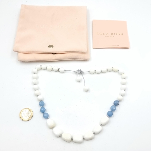 448 - A designer Lola Rose graduated polished white and blue agate and  necklace, with pretty tassel accen... 