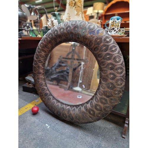 457 - A stunning large circular wall mirror by Tara Living, with a pierced metal ogee patterned frame. D: ... 