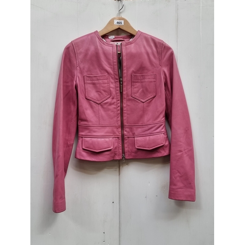 465 - A designer Tommy Hilfiger pink leather collarless leather jacket, with double zip and four pockets. ... 