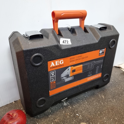 472 - An AEG 800W 115mm small angle grinder. As new, in original hard carry case. This model has a compara... 