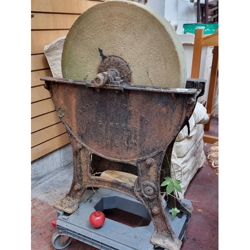 477 - Star lot : A fantastic large  antique sharpening stone on a cast iron base, by Booth Brothers Engine... 