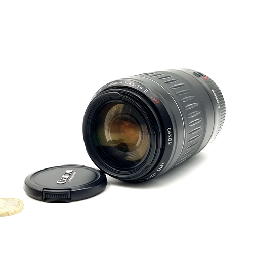 617 - A Canon Ultrasonic 55-200mm camera lens in PWO with lens cap. Designed for EF mount. Fstop 1: 4.5 - ... 