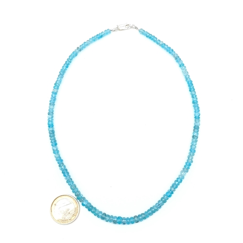 654 - A beautiful choker style Blue Appetite graduated necklace, of 100 carats and set with a sterling sil... 