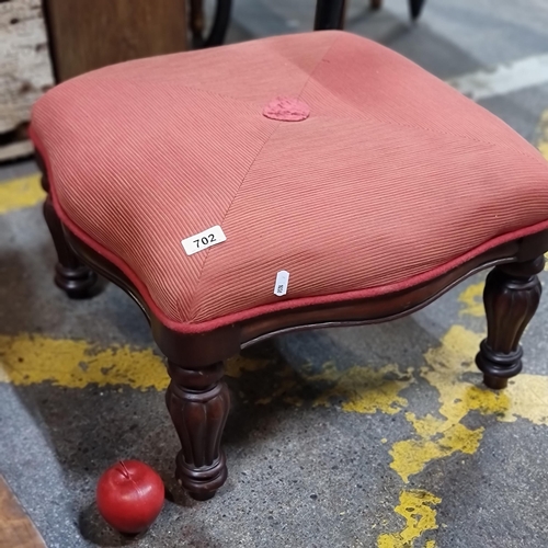 702 - A charming large antique footstool with trumpet legs and upholstered in a red and cream fabric. Very... 