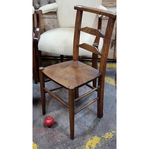 703 - A nice antique solid wood ladder back arts and crafts chair.