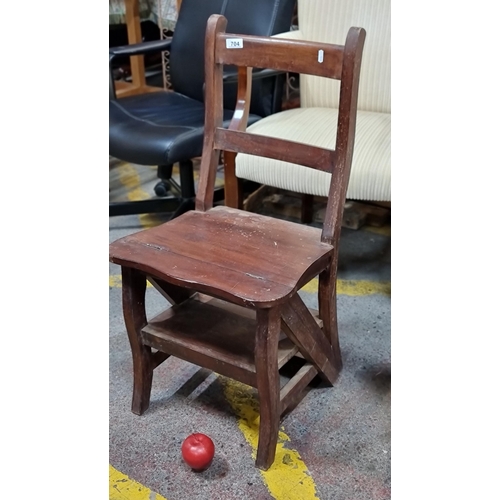 704 - A great example of an antique foldable library ladder chair, which folds out to reveal a four step l... 