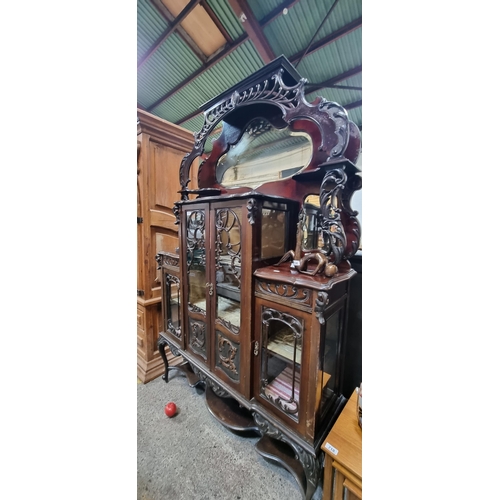 717 - Star lot : A very elaborate Victorian display cabinet with intricate Art Nouveau style decoration in... 