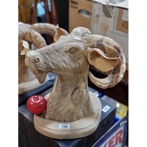 728 - A hand carved solid wood sculptural bust of a goat head, nice detailing on the fur and horns.