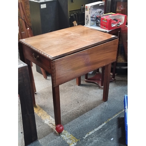 734 - A lovely vintage drop leaf table with nice carved detail to sides and a drawer at one end. Very clea... 