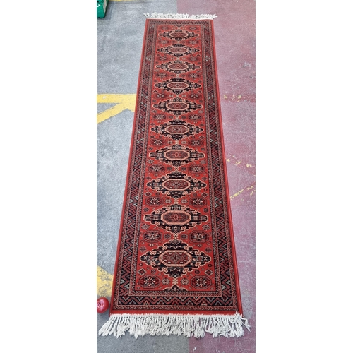 737 - Star lot : A fabulous high quality hall rug made of 100% wool by Super Keshan. In a red and blue Per... 