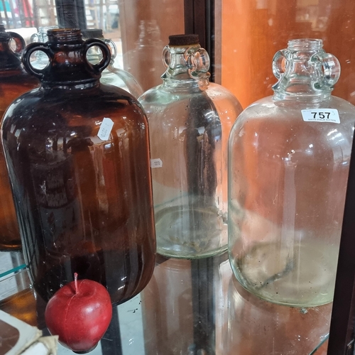 757 - Three vintage glass growler jugs, perfect for fermenting beers or wines.