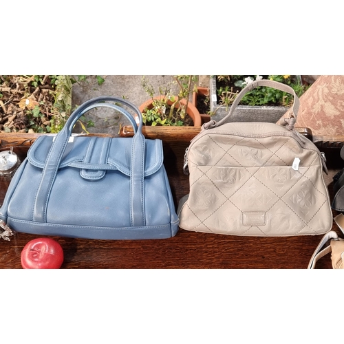 765 - Two charming leather ladies original Radley handbags. In good condition. Good brand and nice style o... 