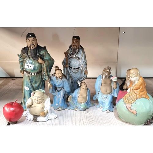 777 - Eight fantastic ceramic Chinese elder figures in traditional dress, with both matte and high-gloss f... 