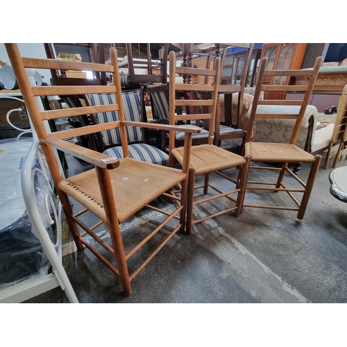 782 - Three wonderful traditional Irish sugan chairs, with slatted backs and woven seats, including one gr... 