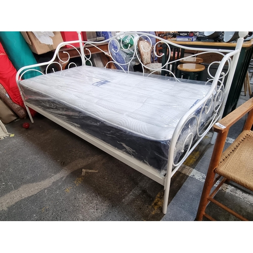 786 - A wonderful brand new day bed, with open work frame and glossy white finish. With a brand new Sleepe... 