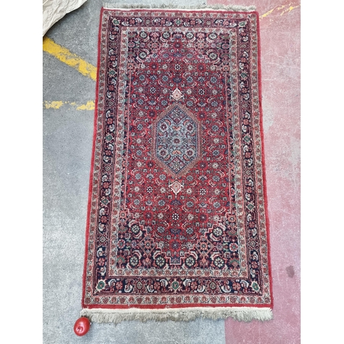 796 - Star lot : A beautiful high quality hand made and hand knotted Persian wool rug, beautifully decorat... 