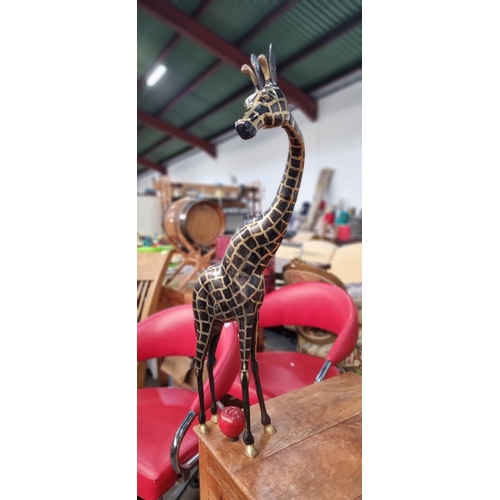 797 - A very cool tall, metal free stranding sculpture of a giraffe. Blackened brass accents and elongated... 