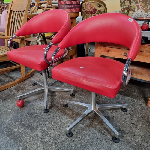 800 - Star Lot : A pair of heavy super Cool Mid Century Modern swivel tub chairs. Supported by a chrome, s... 