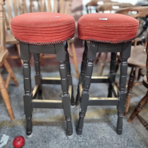 847 - Two vintage barstools with turned wood legs, brass detailing on stretchers and upholstered in a warm... 