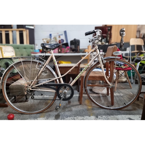 851 - A lovely  Peugeot vintage women's bicyle in a light cream and luggage rack to back. Made in France. ... 