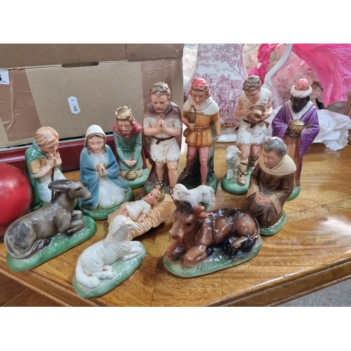 863 - A beuatiful set of vintage porcelain nativity crib figures including baby Jesus, Mary & joseph, the ... 