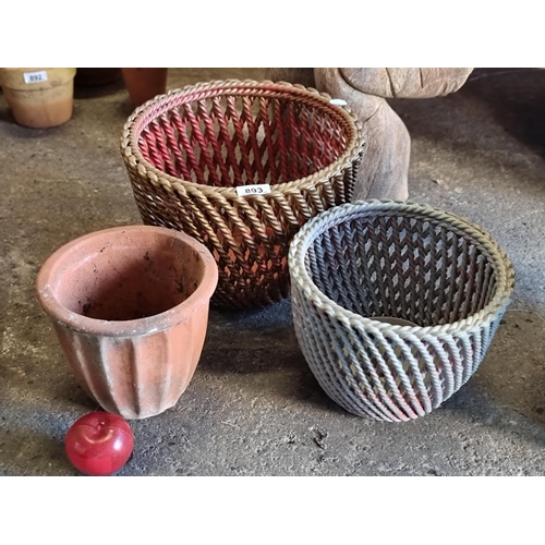 893 - Three planters including two with ceramic  woven rope design examples and one terracotta example. Th... 