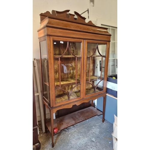 903 - Star lot : A gorgeous Edwardian display cabinet with astro-glazed door panels, two green velvet shel... 