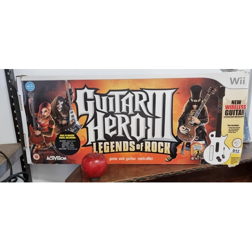 912 - Guitar Hero III Legends of Rock game and Les Paul controller for the Wii console, by Activision. Inc... 