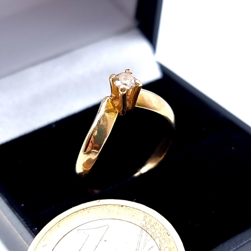 469 - Star lot: A striking 14 carat gold Diamond ring, which features an unusual crown setting and a broad... 