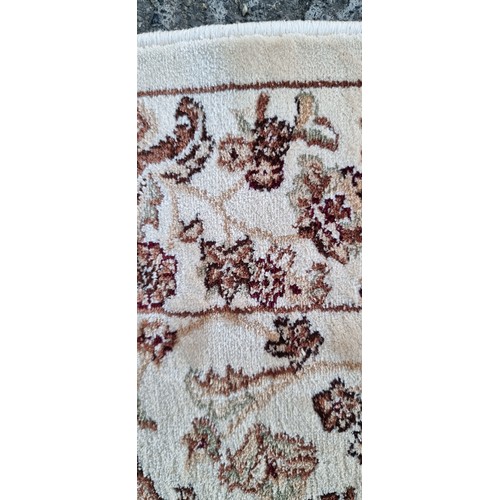 818 - Star lot: A nice Kashmiri hall runner rug in beige and brown shades, with fringe trim. W77cm x L315c... 