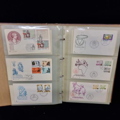 177 - A fantastic stamp album with over one hundred First Day Covers from The Vatican City. Including Pope... 