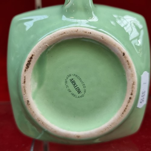 356 - Star lot : An Arklow Pottery Millar's jug in a mint green. In super condition Comp on eBay from 2022... 