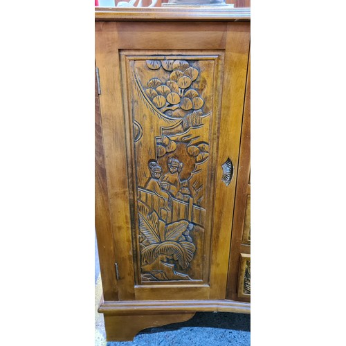 679 - Star lot : A fabulous Chinese Rosewood credenza with four drawers to front flanked by two cupboards ... 