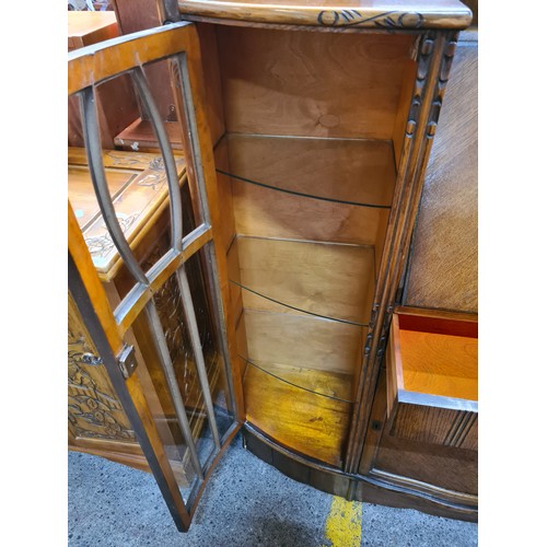 680 - Star lot : A fantastic Art Deco writing table with two astroglazed display cabinets to each side wit... 