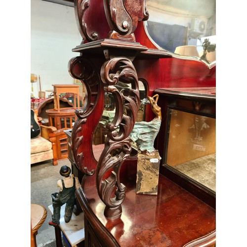 717 - Star lot : A very elaborate Victorian display cabinet with intricate Art Nouveau style decoration in... 