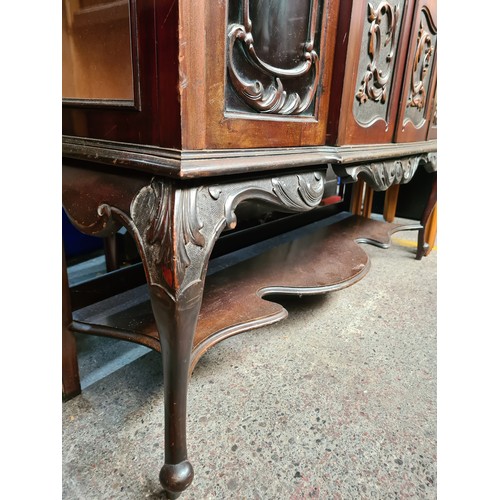 717 - Star lot : A very elaborate Victorian display cabinet with intricate Art Nouveau style decoration in... 