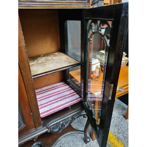 717 - Star lot : A very elaborate Victorian display cabinet with intricate Art Nouveau style decoration in... 