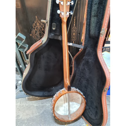 801 - A McBrides branded Banjo instrument. With a REMO WeatherKing branded banjo head, made in the USA. Wi... 