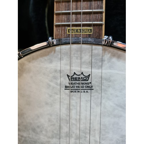 801 - A McBrides branded Banjo instrument. With a REMO WeatherKing branded banjo head, made in the USA. Wi... 