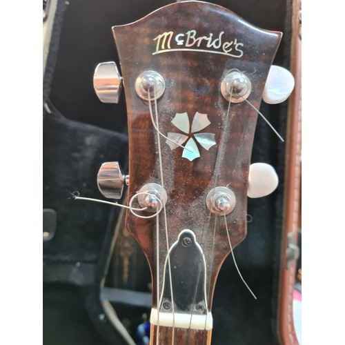 801 - A McBrides branded Banjo instrument. With a REMO WeatherKing branded banjo head, made in the USA. Wi... 