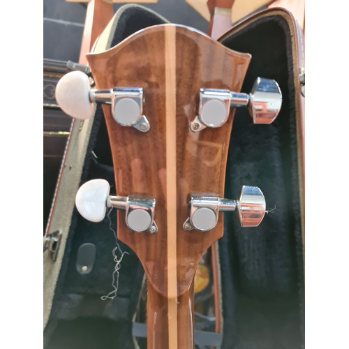 801 - A McBrides branded Banjo instrument. With a REMO WeatherKing branded banjo head, made in the USA. Wi... 