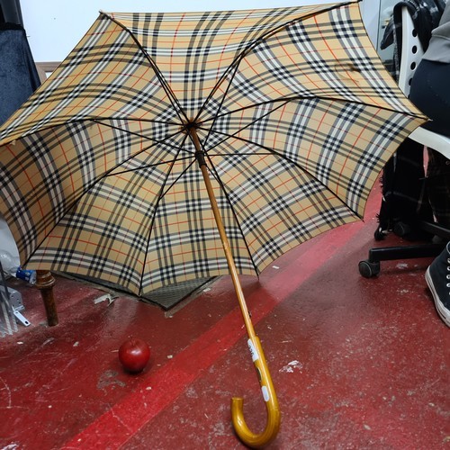 791 - A fabulous original Burberry umbrella featuring the classic nova check pattern in beige, navy blue a... 