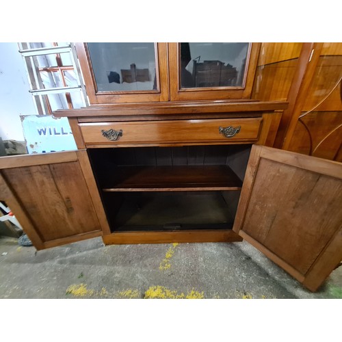 895 - Star Lot : A gorgeous Victorian Bookcase with glass doors to top with two shelves inside, pull out d... 