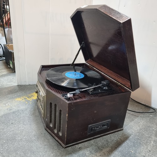 709 - A Sherwood brand record player/turntable and cassette deck. In a rich, dark wood case. Stylus includ... 